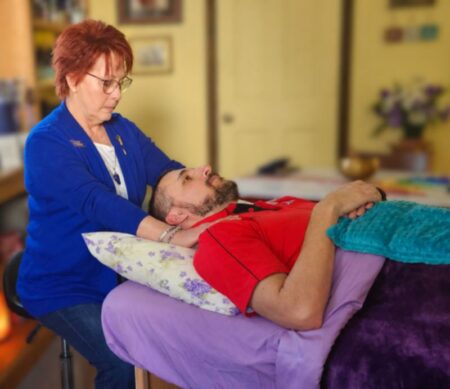 Melissa Curran providing a nervous system regulation session at Scented Balance Healing Arts in Winston-Salem, NC,